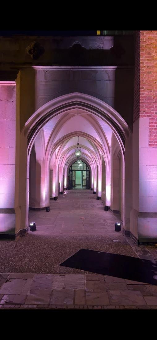 Stone arches lit in soft pink